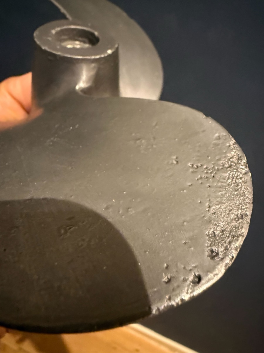 Cavitation erosion on a real ship propeller